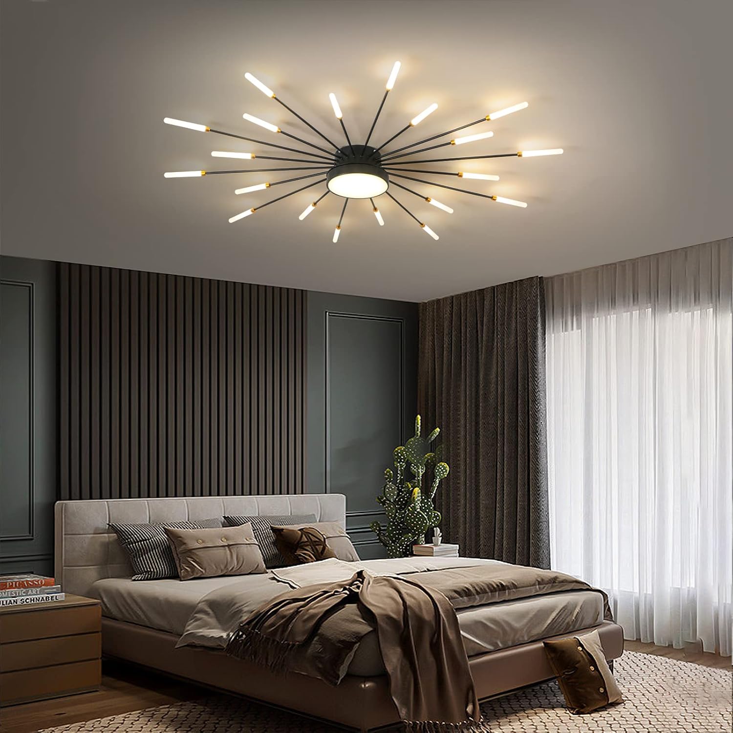 Modern bedroom with a stylish ceiling light fixture, bed, and decor.
