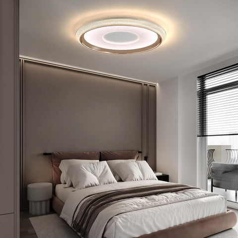 Modern bedroom with a ceiling light fixture