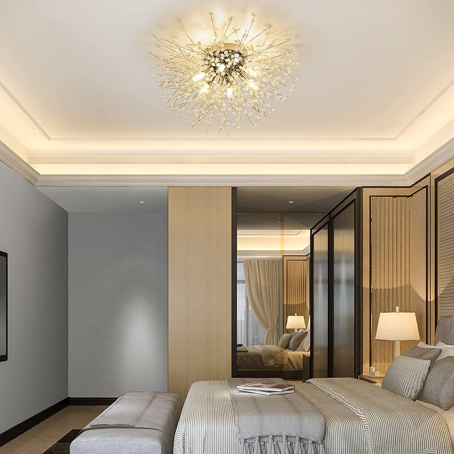 Modern bedroom with a decorative ceiling light fixture.