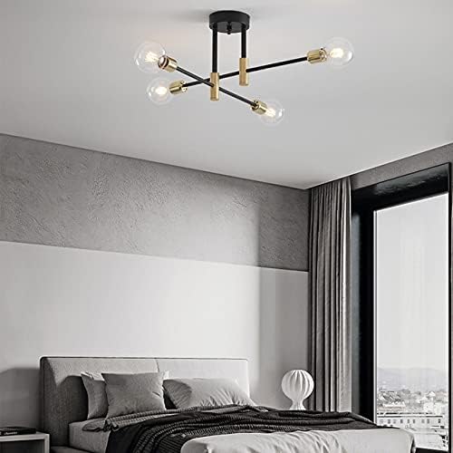 Modern ceiling light fixture in a bedroom setting with a bed and window in the background.