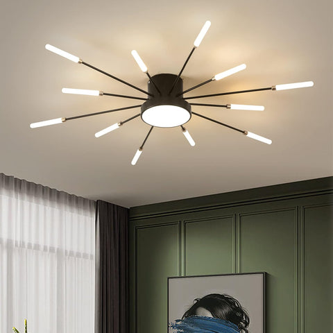 Modern ceiling light fixture in a room with green walls and white curtains.