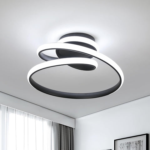Modern ceiling light fixture in a room with white walls and a window.