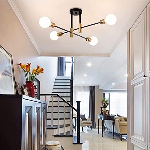 Modern ceiling light fixture in a stylish interior setting with staircase and decor.