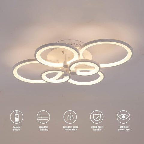 Modern ceiling light fixture with circular design on a neutral background