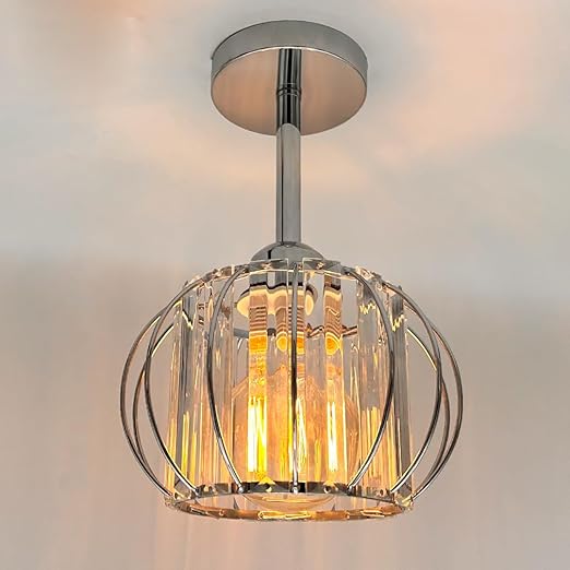 Modern ceiling light fixture with crystal design on a neutral background