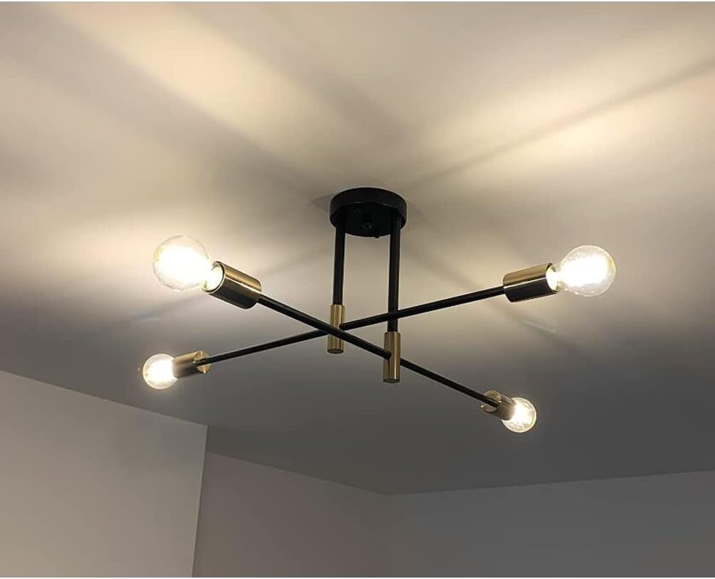 Modern ceiling light fixture with four bulbs on a ceiling