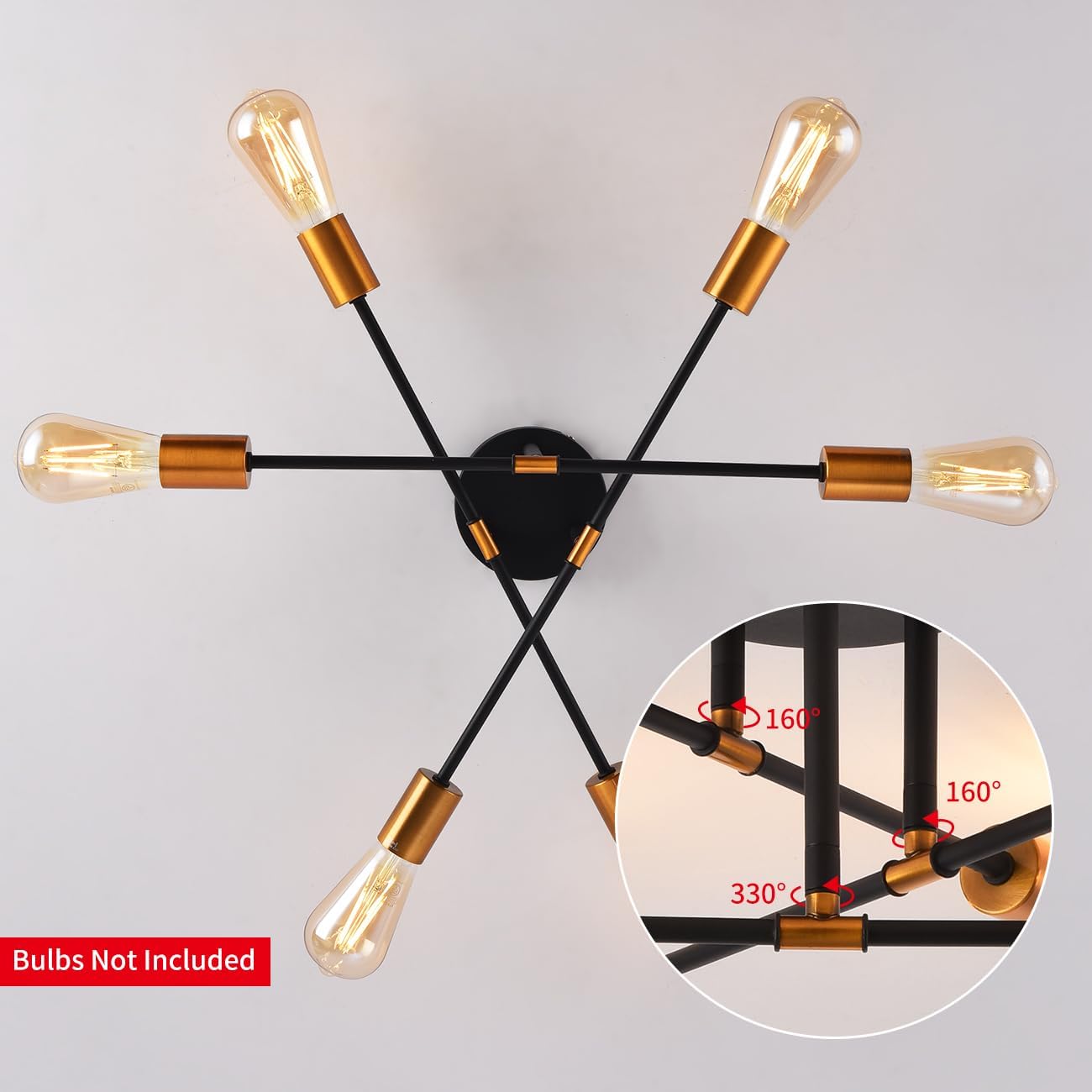 Modern ceiling light fixture with gold and black design on a gray background