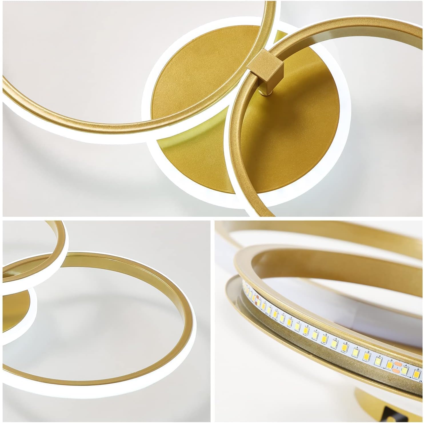 Modern ceiling light fixture with gold and white rings on a neutral background