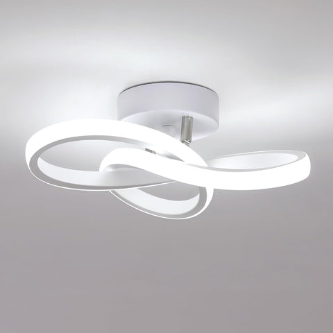 Modern ceiling light fixture with three circular shades on a gray background