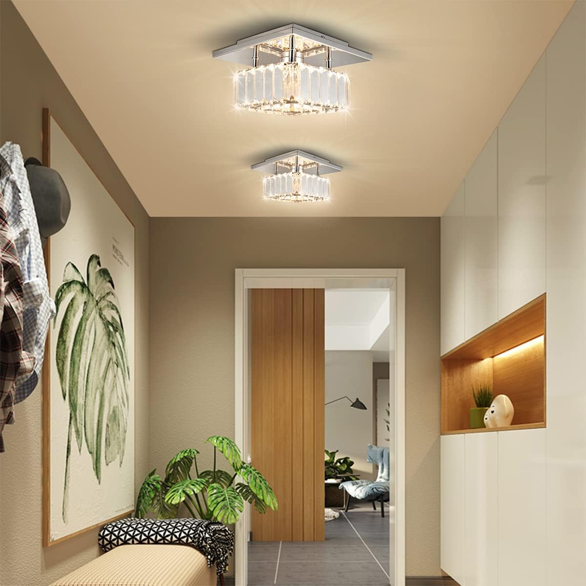 Modern ceiling lights in a hallway with a view into a living room.