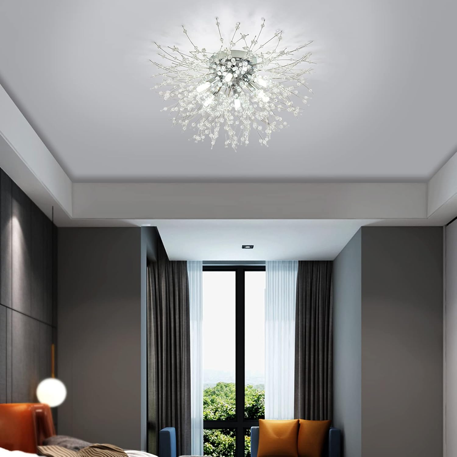 Modern chandelier in a stylish room with gray walls and a large window.