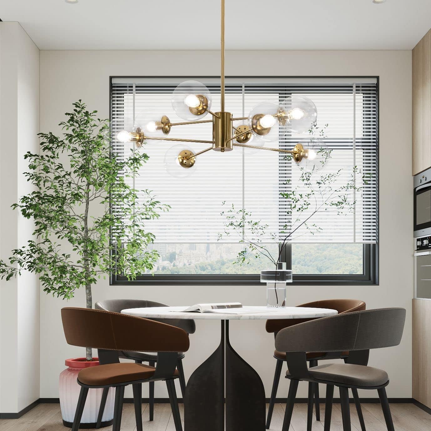 Modern dining area with a chandelier, table, and chairs near a window.