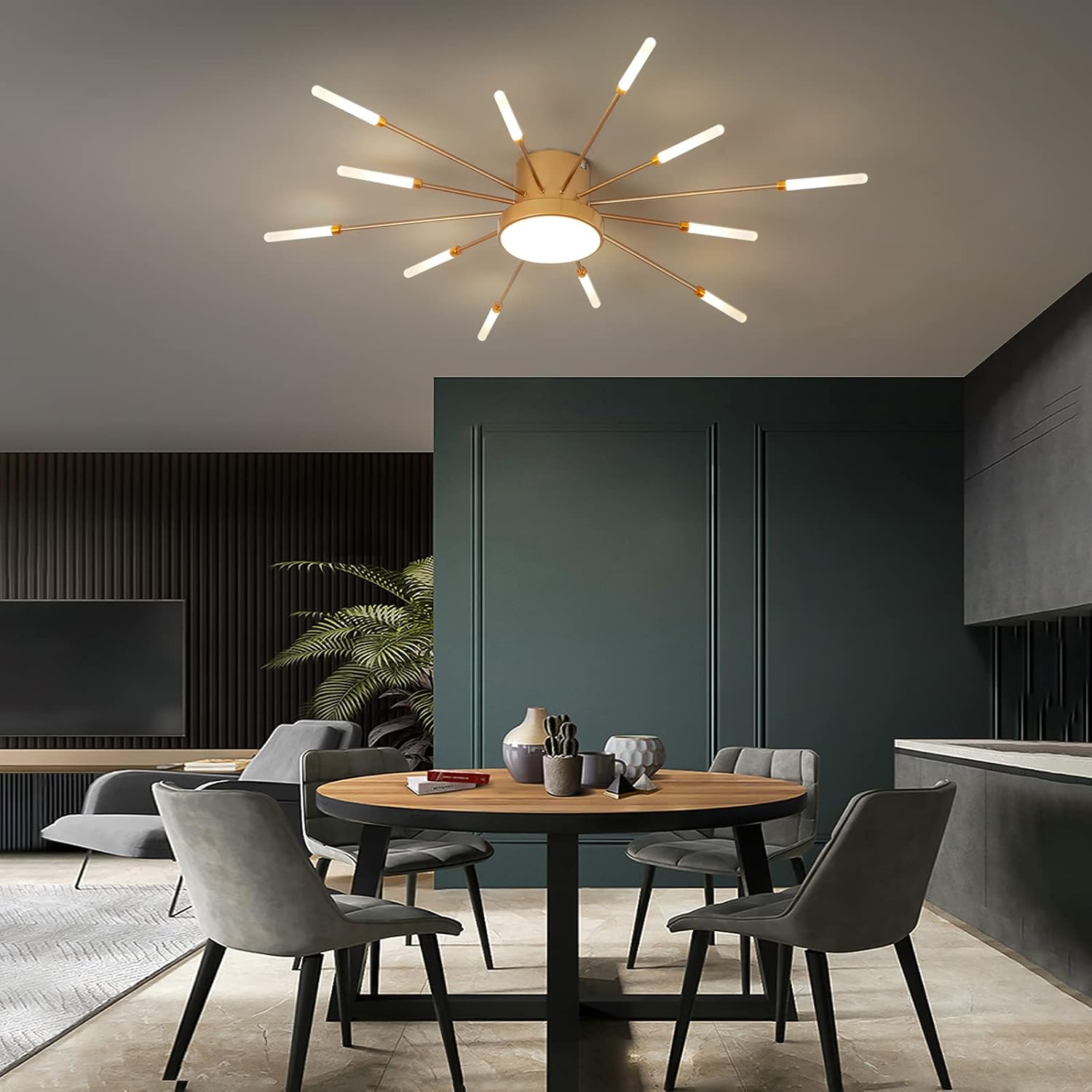 Modern dining room with a ceiling light fixture, table, and chairs.