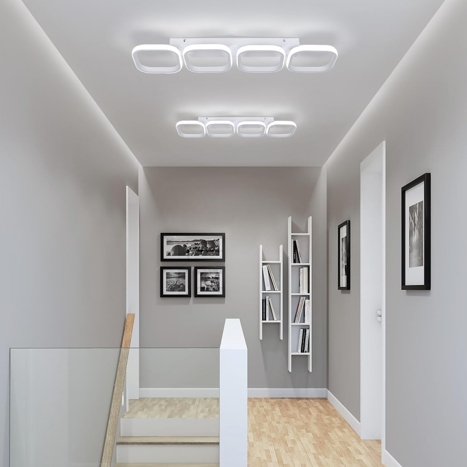 Modern hallway with ceiling lights, bookshelf, and framed pictures.