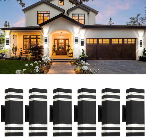 Modern house exterior with decorative wall lights shown below.