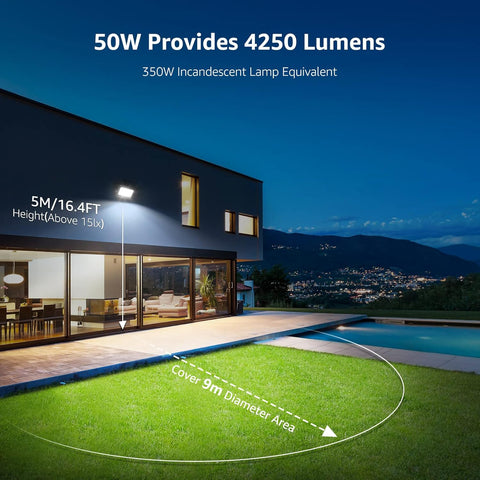 Modern house exterior with outdoor lighting system, pool, and mountain view.