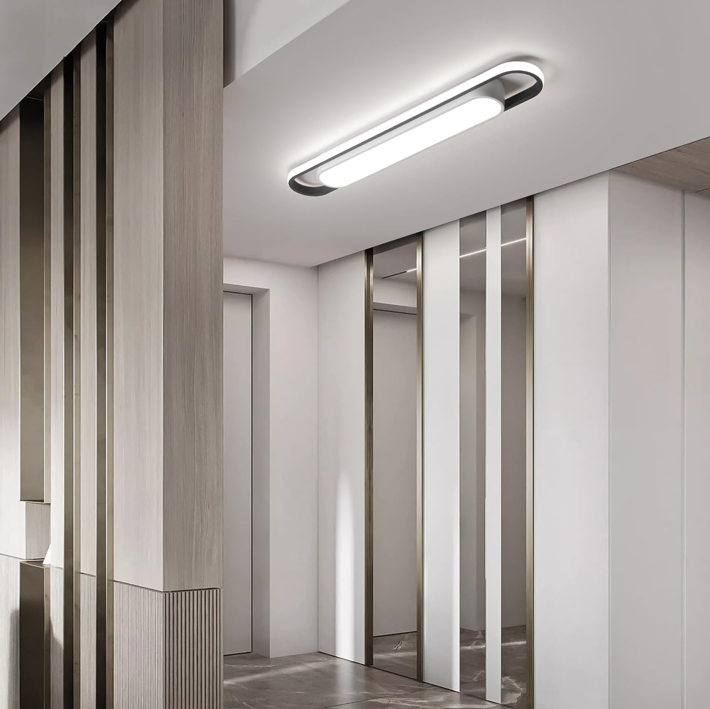 Modern interior design with a ceiling light fixture in a hallway.