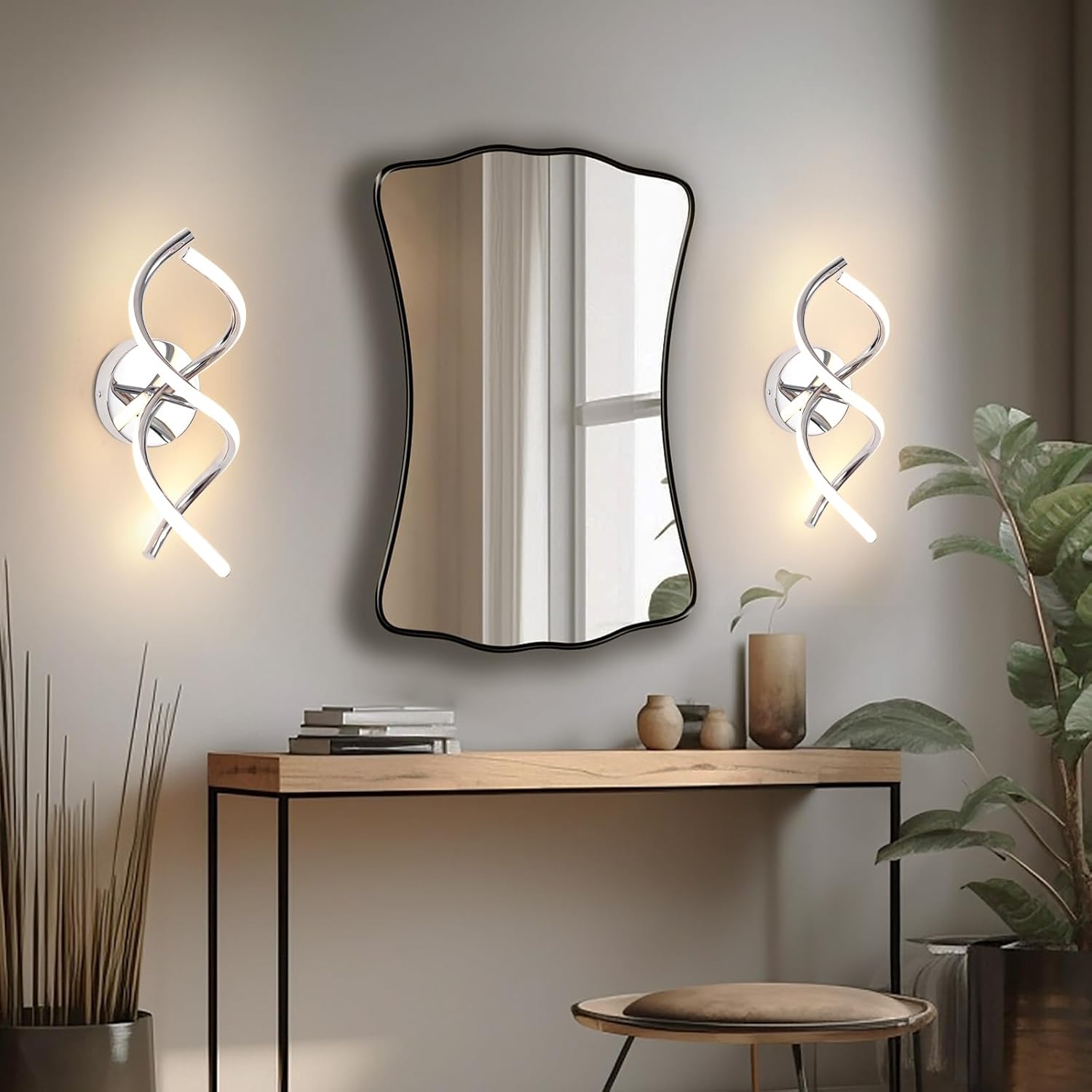 Modern interior design with a mirror, console table, and wall lights.