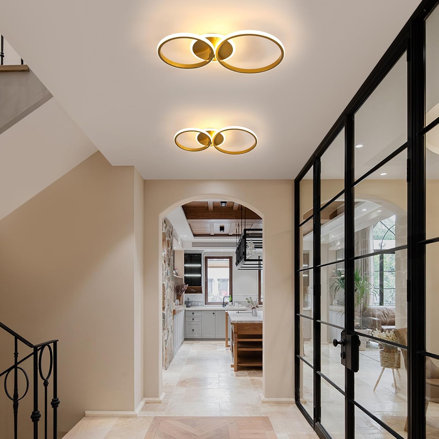 Modern interior with ceiling lights and a glass door leading to a kitchen.
