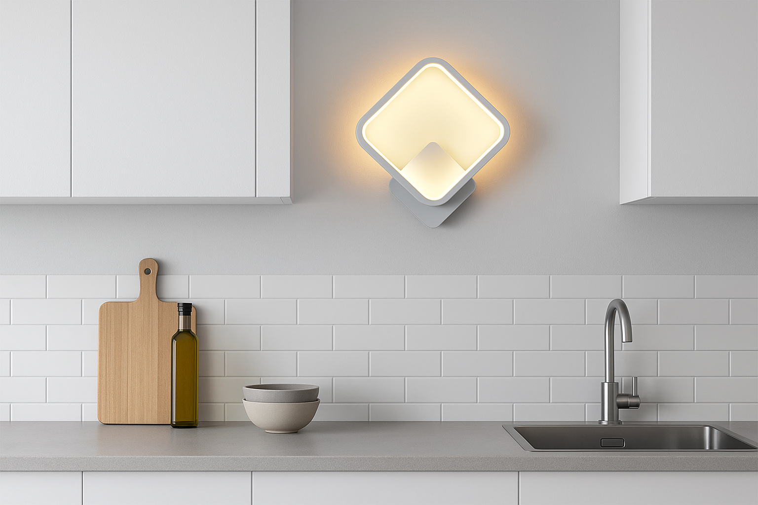 Modern kitchen with a wall-mounted light fixture, cutting board, and bottles on the counter.