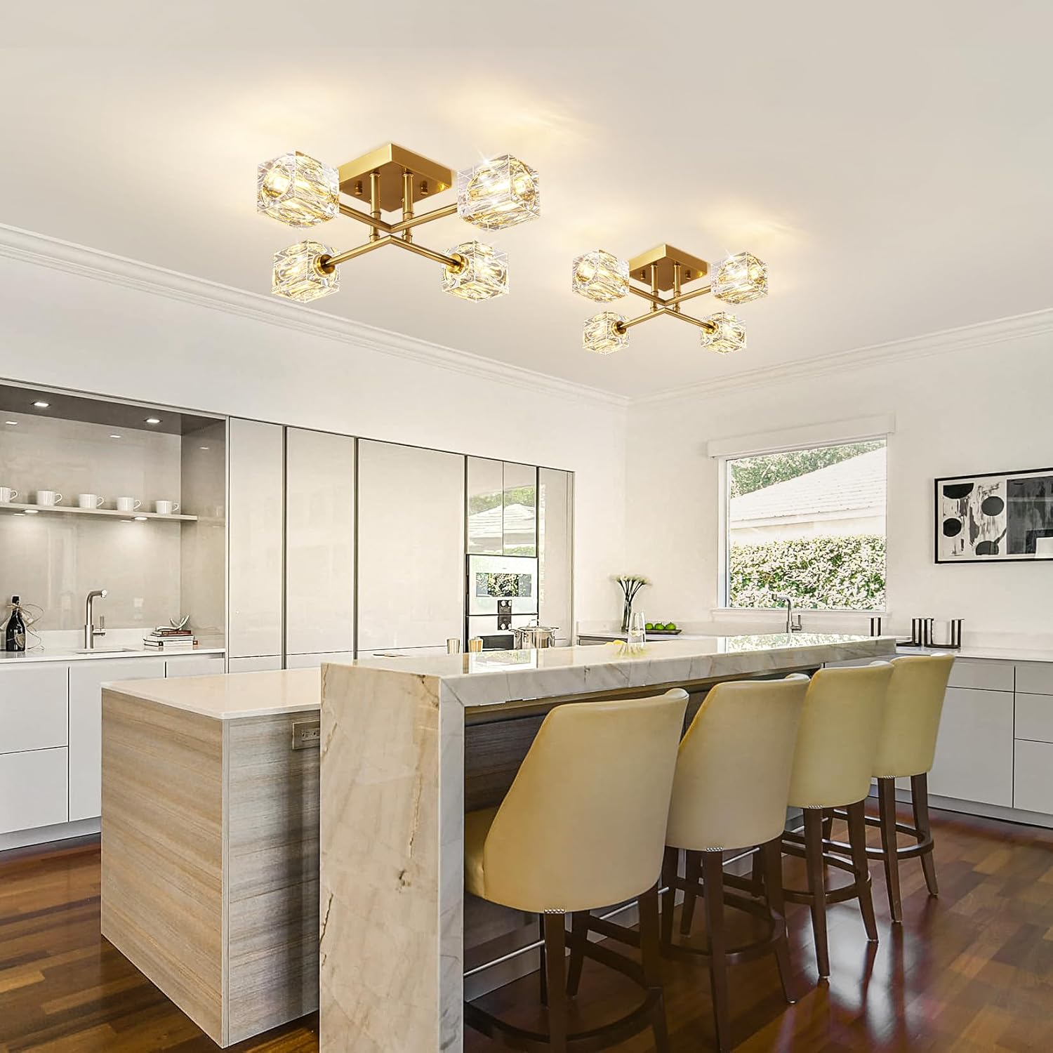 Modern kitchen with marble island, bar stools, and ceiling lights.