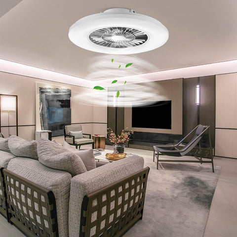 Modern living room with a ceiling fan and stylish furniture.