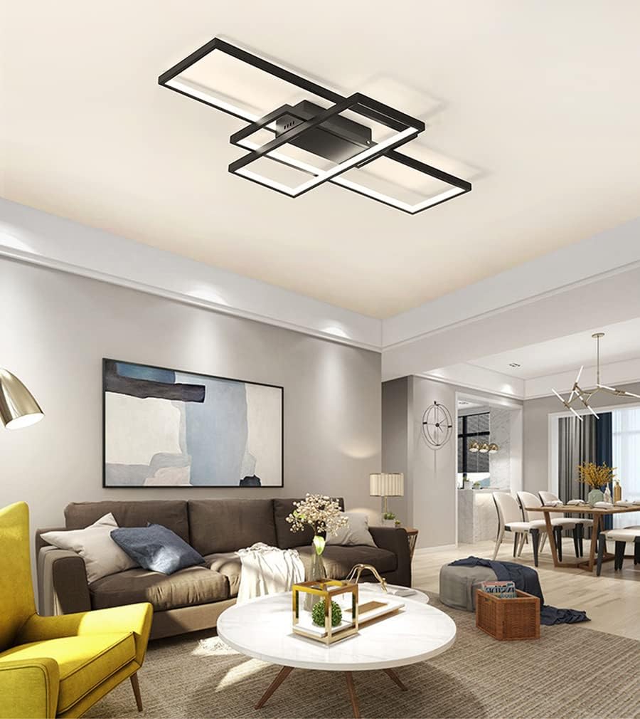 Modern living room with a ceiling light fixture, sofa, and coffee table.