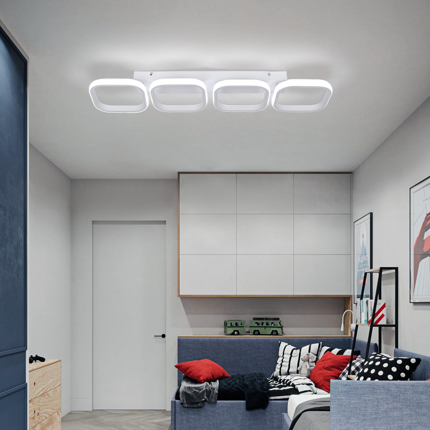 Modern living room with a ceiling light fixture, sofa, and wall art.