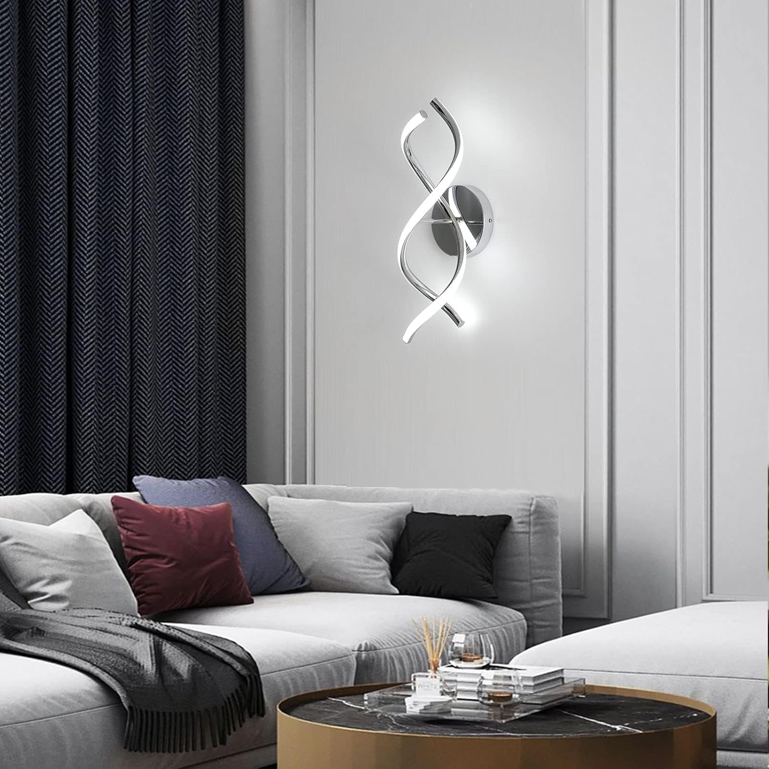 Modern living room with a decorative wall light fixture above a sofa.