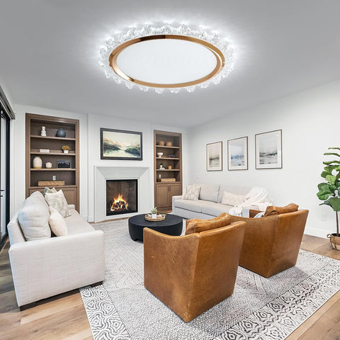Modern living room with a fireplace, bookshelves, and comfortable seating.