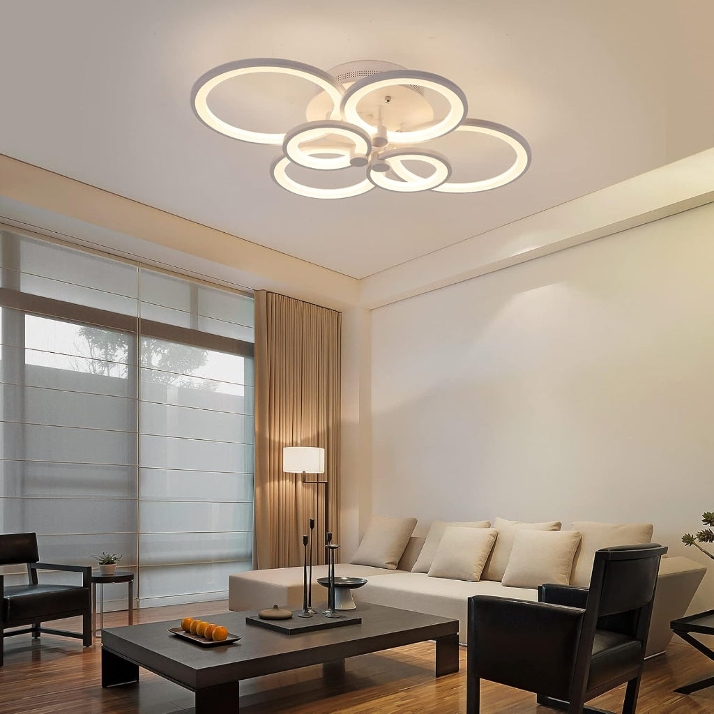Modern living room with a stylish ceiling light fixture.