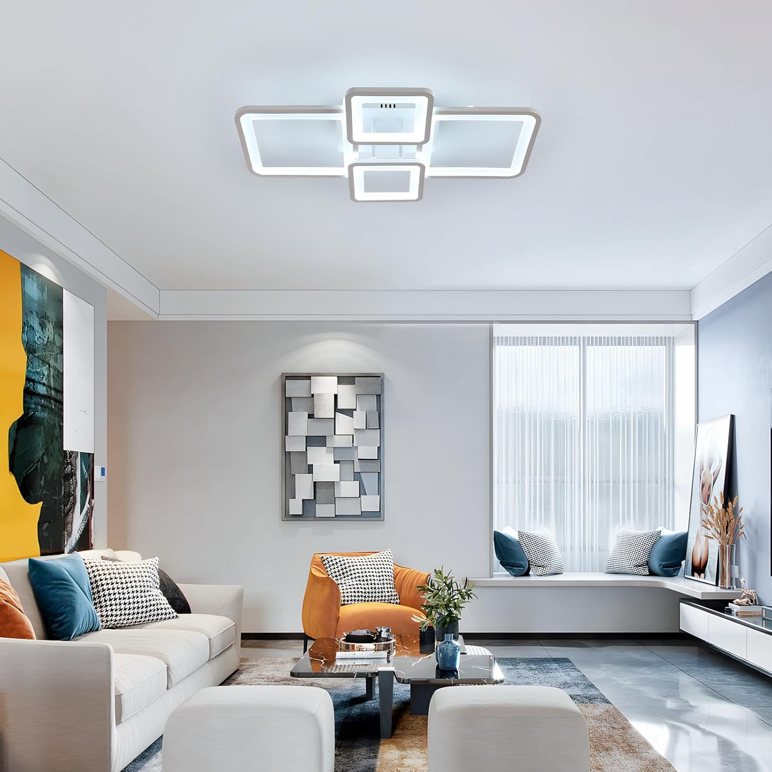 Modern living room with ceiling lights, sofa, and decorative elements.