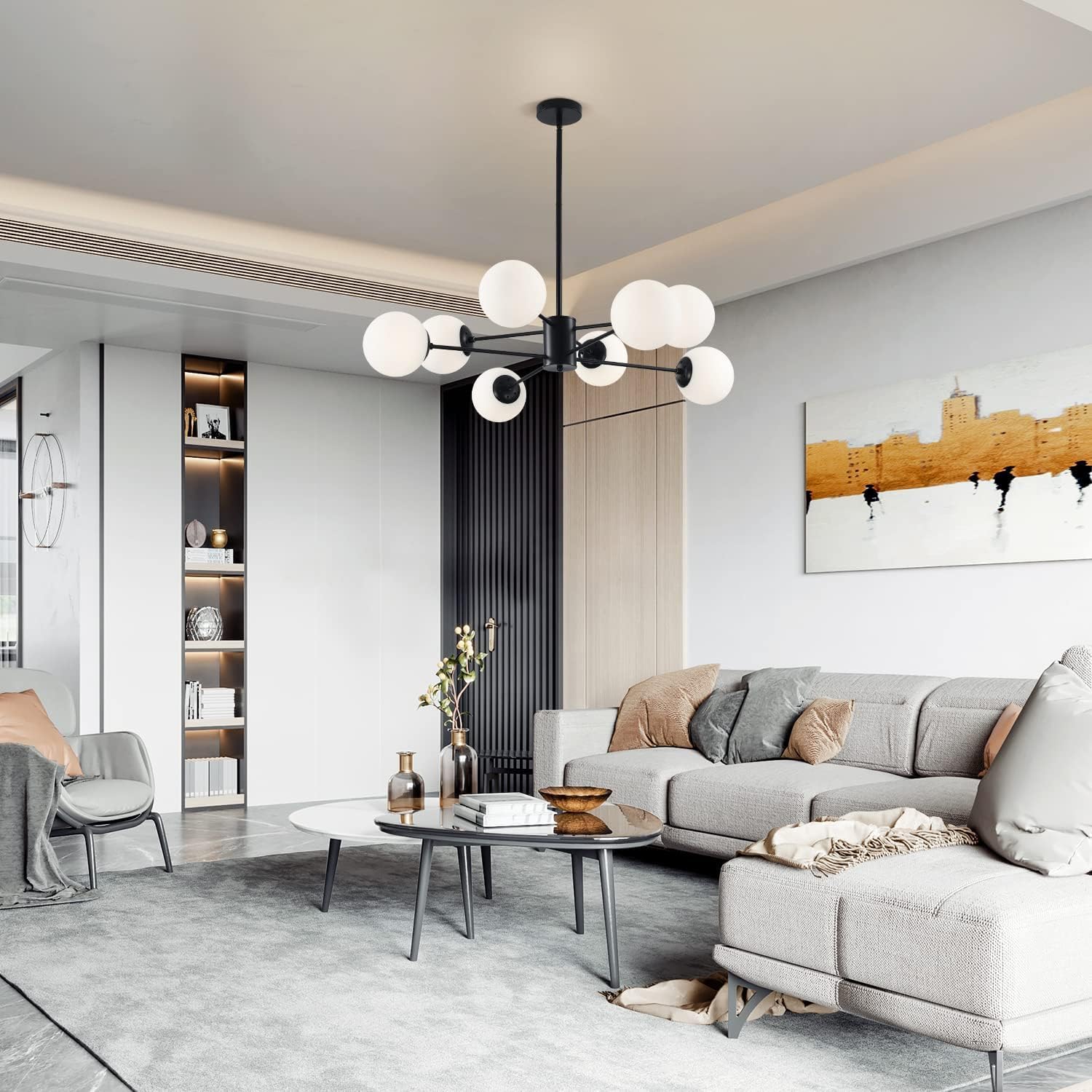 Modern living room with gray sofa, coffee table, and decorative elements.