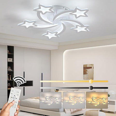 Modern living room with star-shaped ceiling light fixture and remote control.