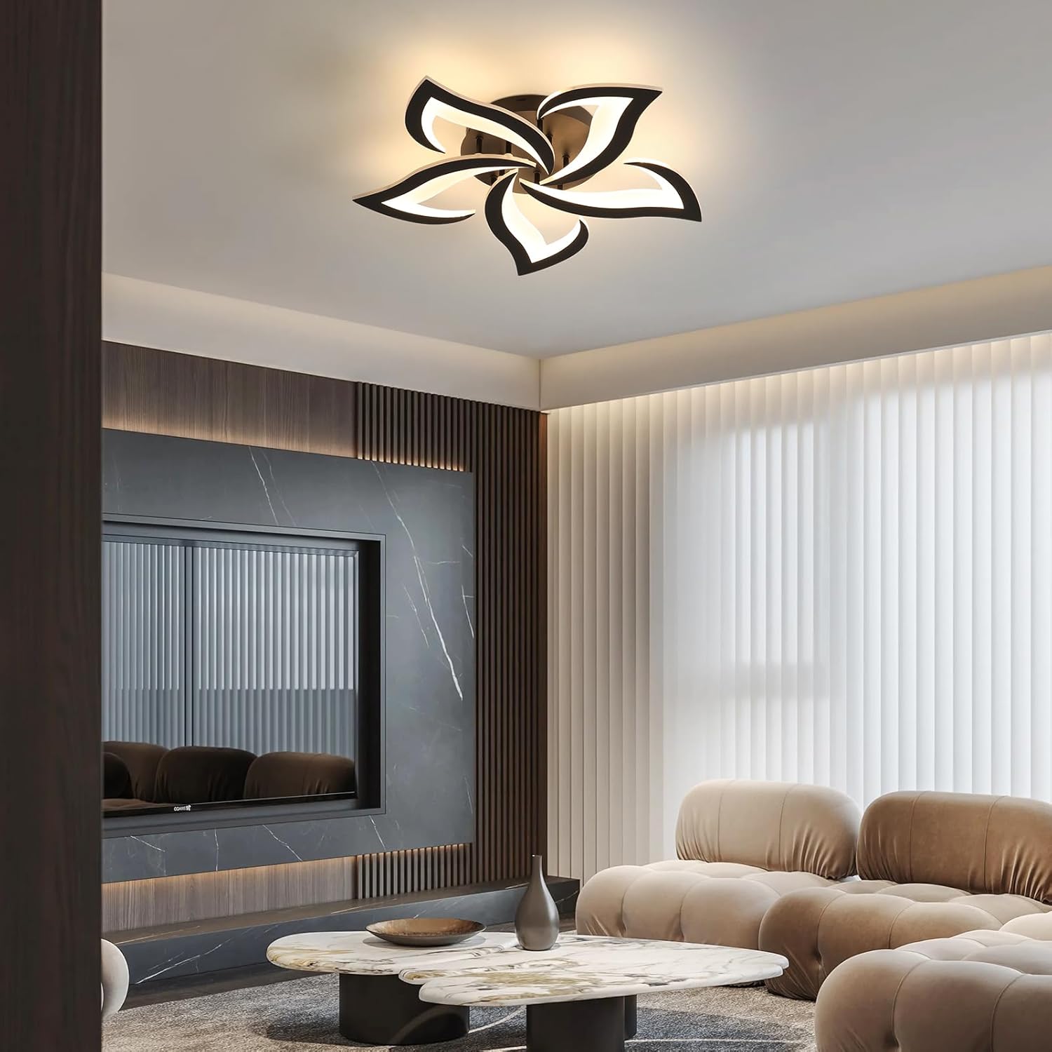 Modern living room with a decorative ceiling light fixture.