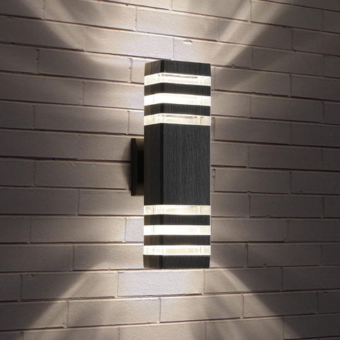 Modern outdoor wall light fixture on a brick wall