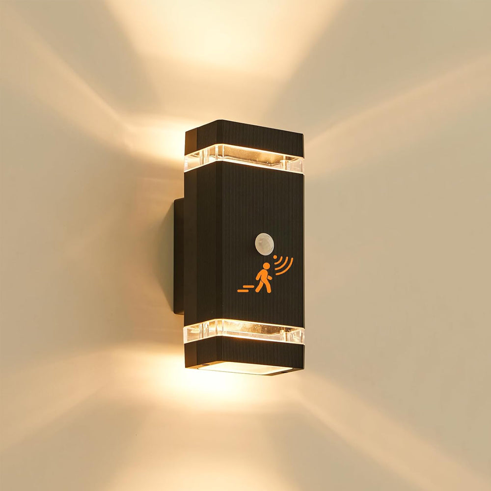 Modern outdoor wall light fixture with sensor icon on a neutral background