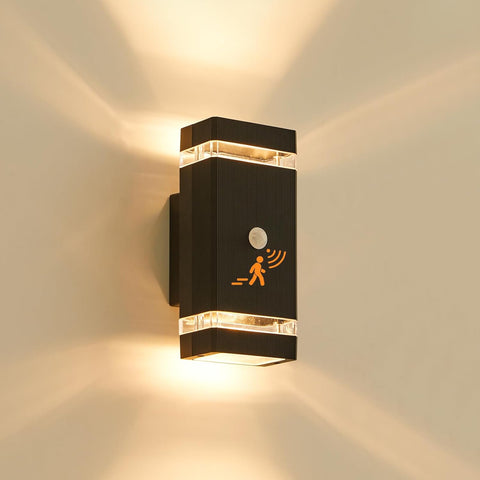 Modern wall-mounted light fixture with sensor icon on a neutral background