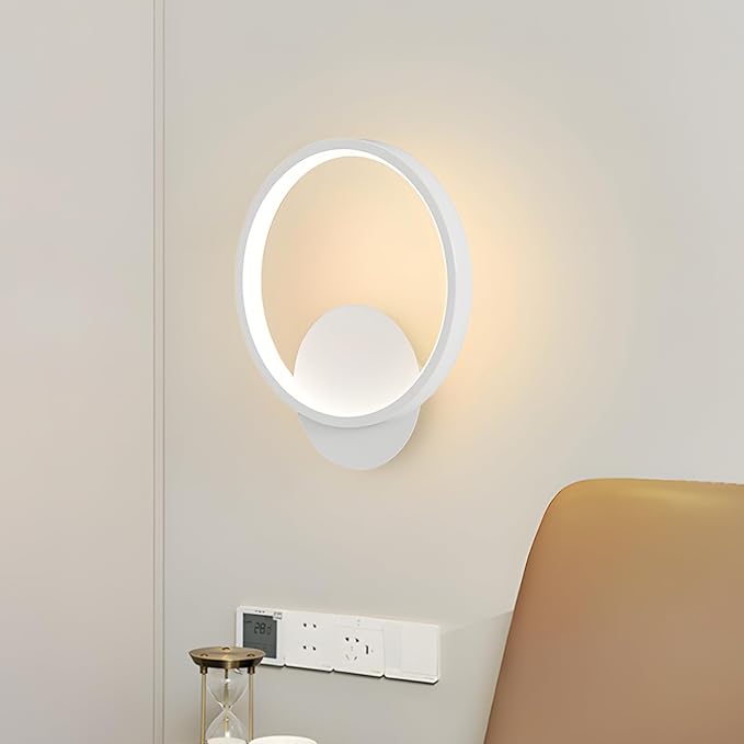 Modern wall lamp on a light gray wall with a neutral color scheme.