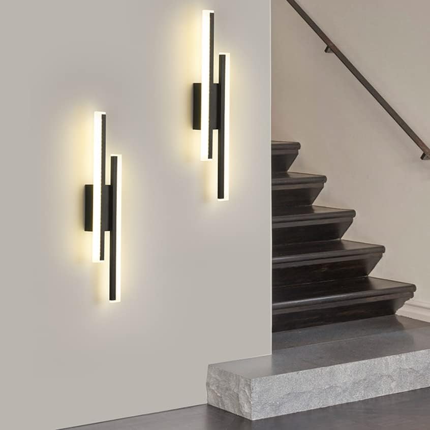Modern wall lights on a staircase with a neutral background