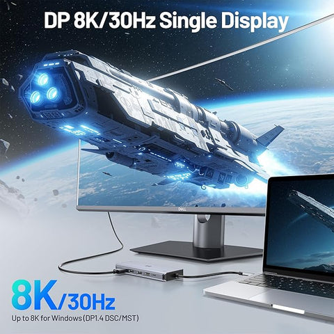 Monitor and laptop displaying a space-themed wallpaper with 'DP 8K/30Hz Single Display' text.