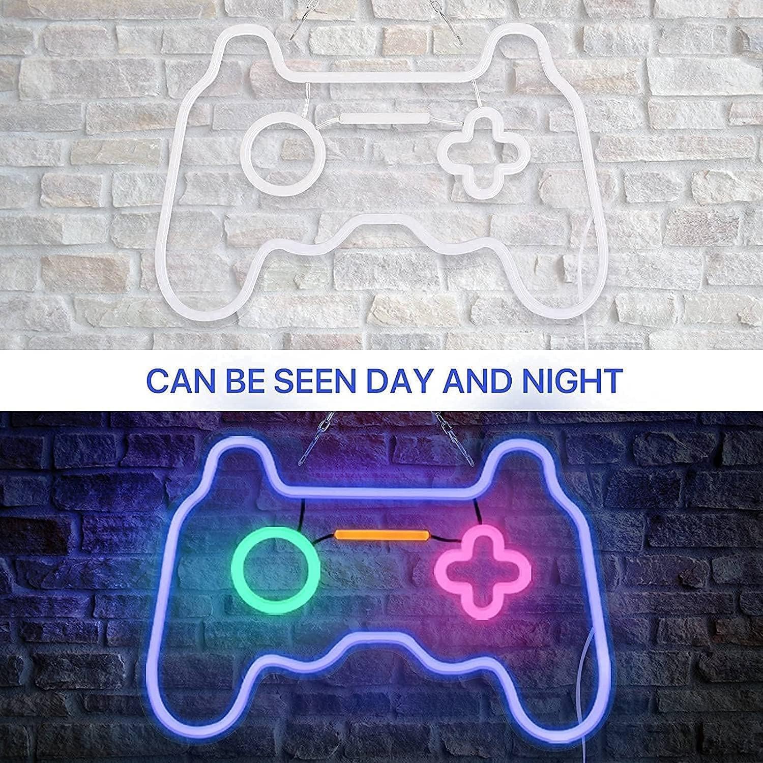 Neon game controller sign on a brick wall with text 'Can be seen day and night'.