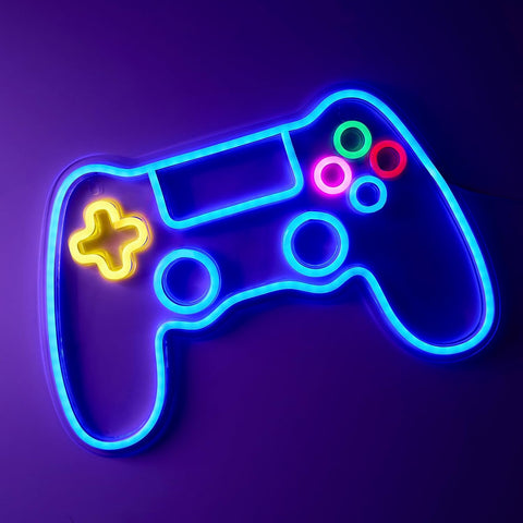 Neon light shaped like a gaming controller on a dark background