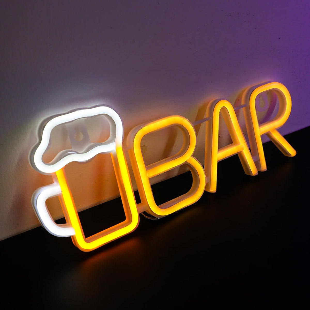 Neon sign with 'BAR' and a beer mug icon on a dark background