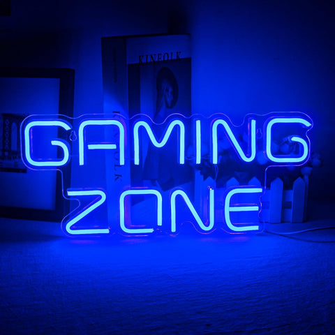 Neon sign with 'Gaming Zone' text in a dark room