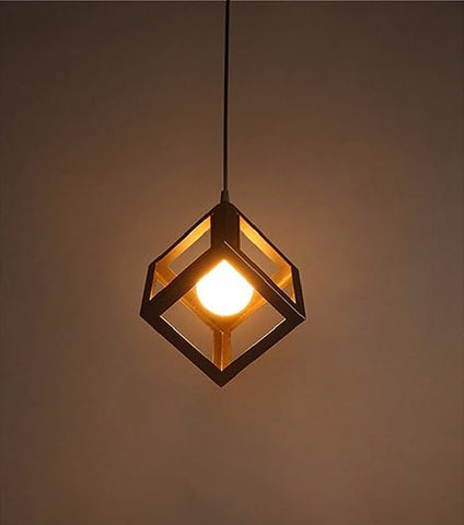 Geometric cube-style pendant light illuminating a stylish kitchen island

