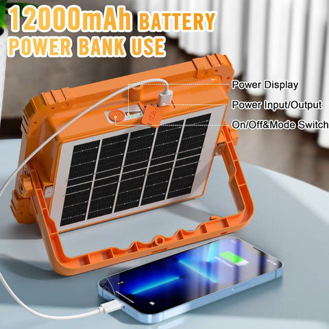 Orange solar power bank with a smartphone being charged, labeled '12000mAh Battery Power Bank Use'.