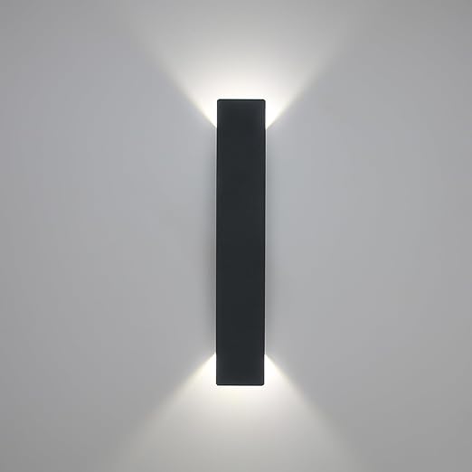Vertical wall sconce emitting up and down lighting

