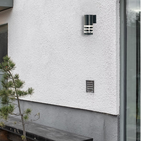 Waterproof outdoor wall light installed on a patio

