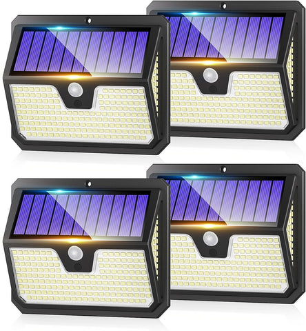 Solar Security Light illuminating a garden pathway at night.​


